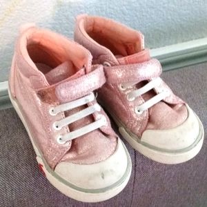 Various items:toddler shoes, pool filter, car CD c